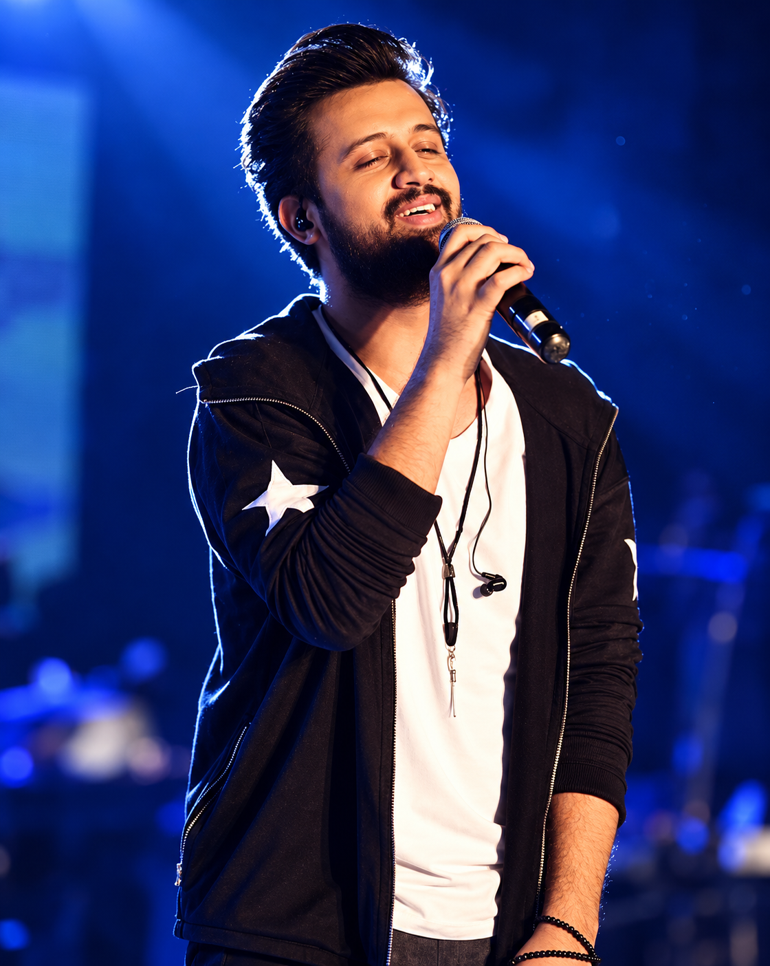Atif Aslam singing on stage